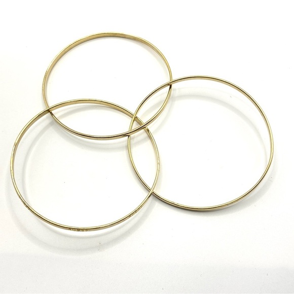 GUESS Gold Interlinked Thin Bangles Set of Three - Picture 6 of 6